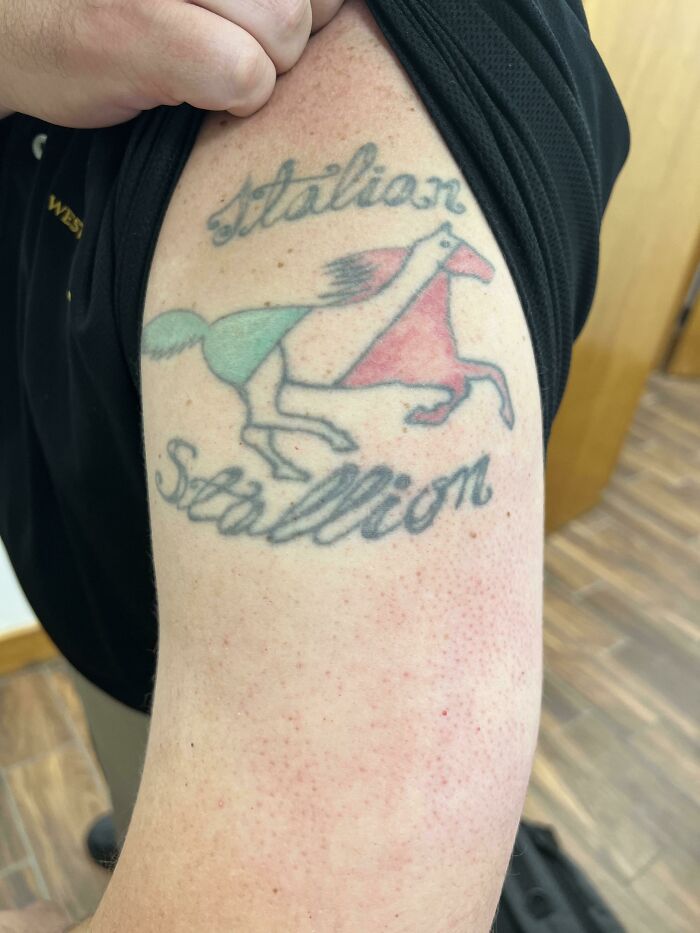 Tattoo of a colorful horse with the text "Italian Stallion," possibly needing better research on tattoo artist.