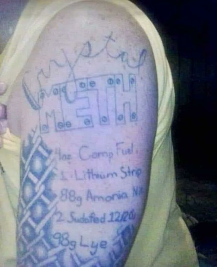 Tattoo of "Crystal M**h" and ingredients on arm, highlighting importance of researching tattoo artist better.