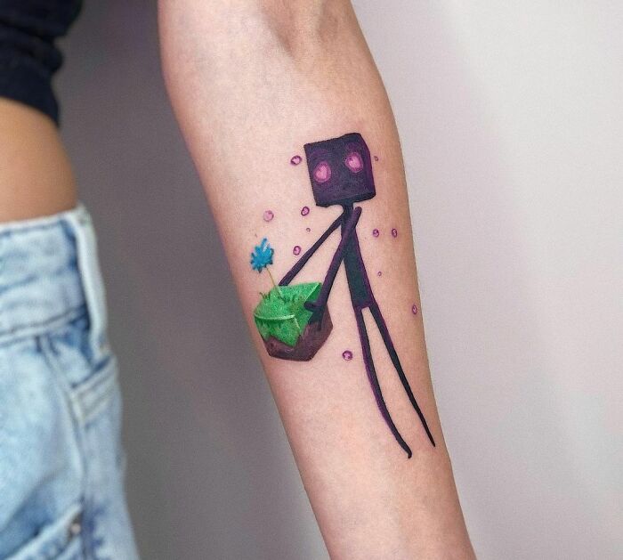 Minecraft tattoo of a blocky, whimsical character holding a grass block and blue flower, perfect for hardcore gamer fans.