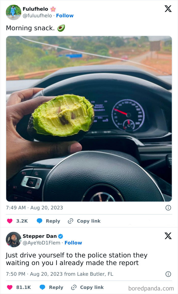 Hand holding a bitten avocado in a car, reflecting a weird meme moment.