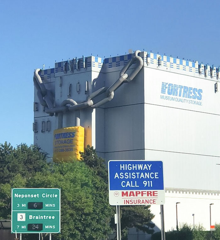 This Inflatable Lock Advertisement On A Storage Building