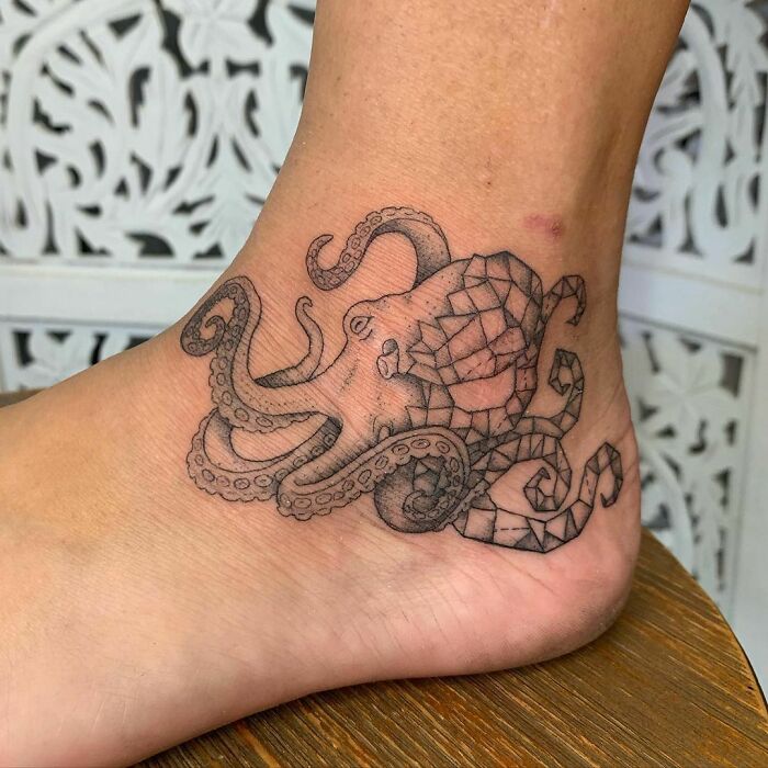 Octopus ankle tattoo design featuring geometric patterns.