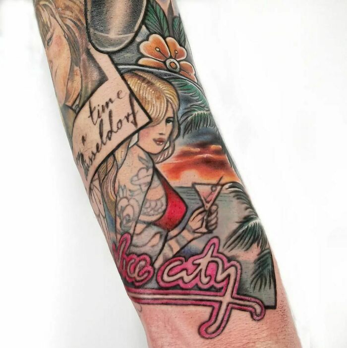 Colorful Grand Theft Auto video game tattoo featuring a woman with a cocktail, tropical setting, and "Vice City" text on the forearm.