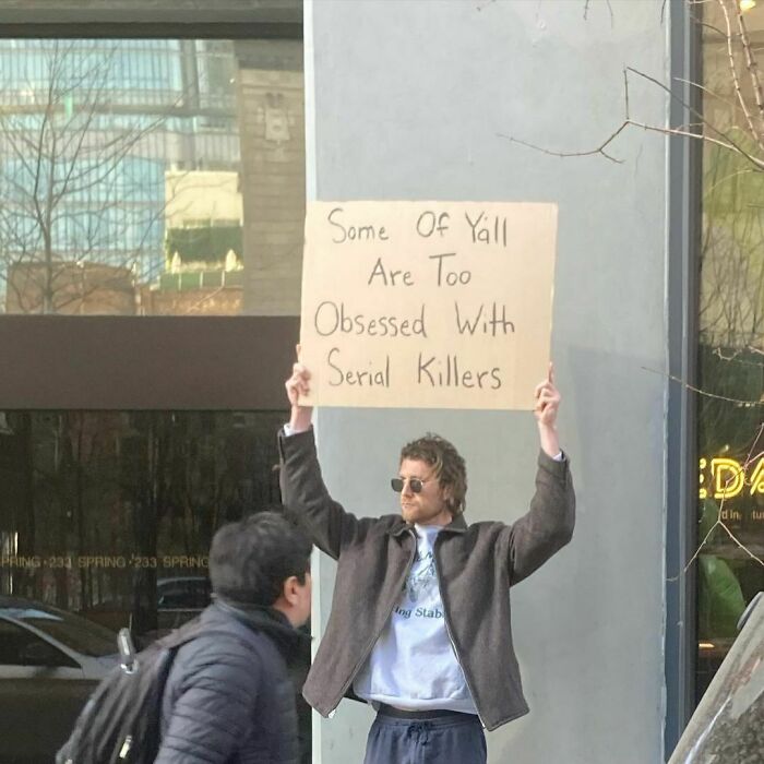 Clever-Dude-With-Sign-Protesting-Annoying-Things