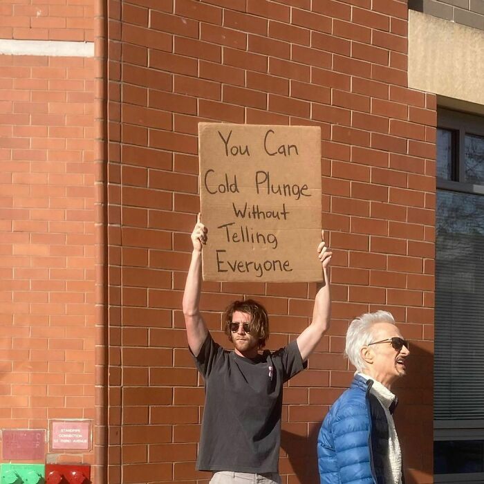 Clever-Dude-With-Sign-Protesting-Annoying-Things