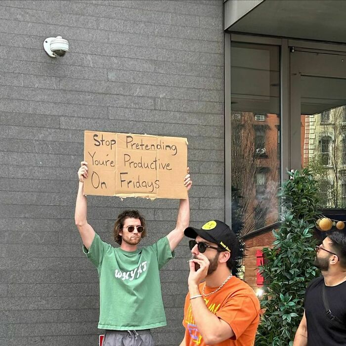 Clever-Dude-With-Sign-Protesting-Annoying-Things