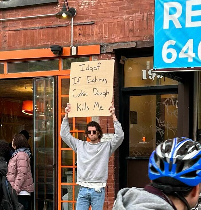 Clever-Dude-With-Sign-Protesting-Annoying-Things
