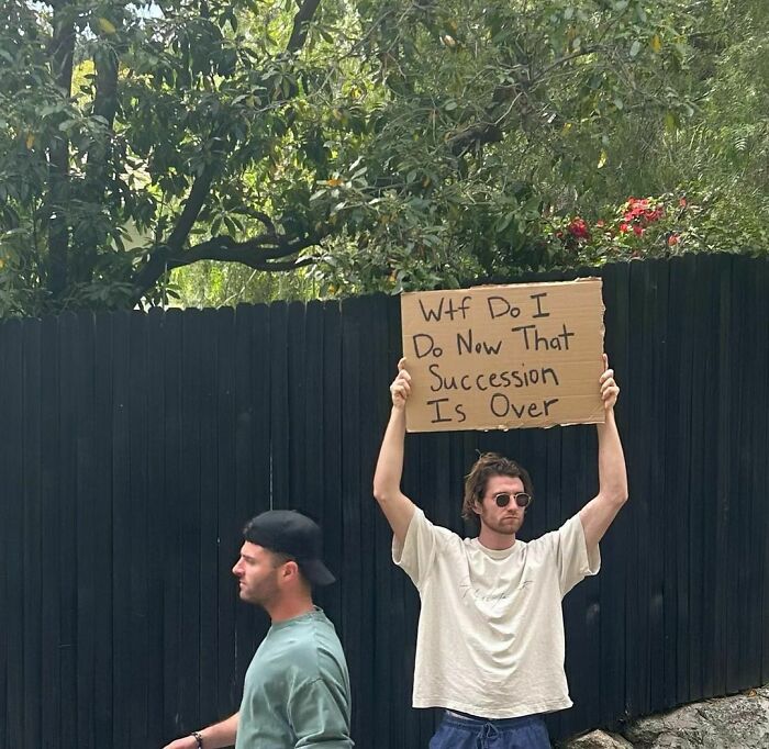 Clever-Dude-With-Sign-Protesting-Annoying-Things