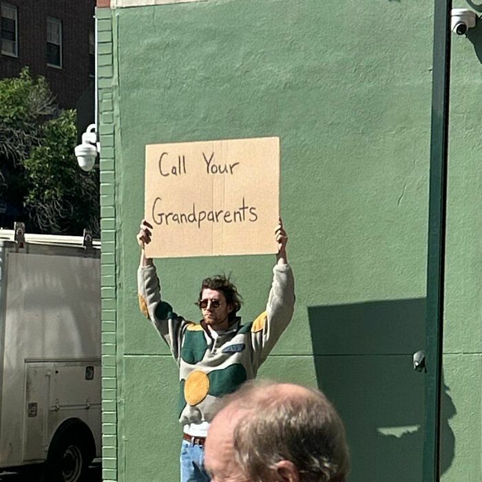 Clever-Dude-With-Sign-Protesting-Annoying-Things
