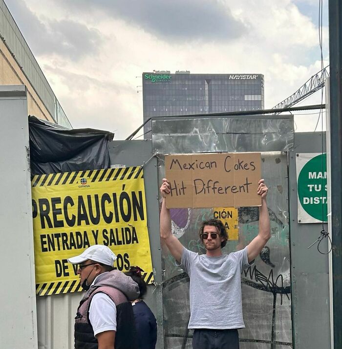 Clever-Dude-With-Sign-Protesting-Annoying-Things