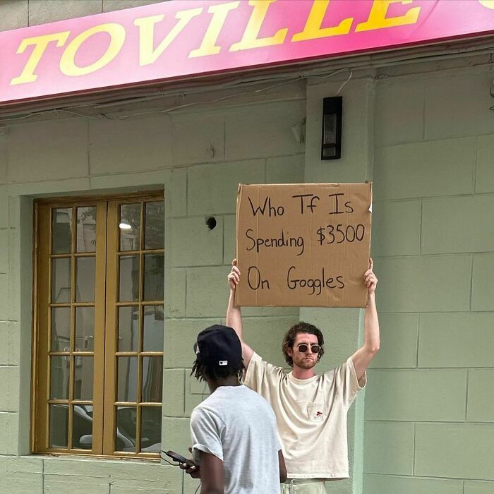 Clever-Dude-With-Sign-Protesting-Annoying-Things