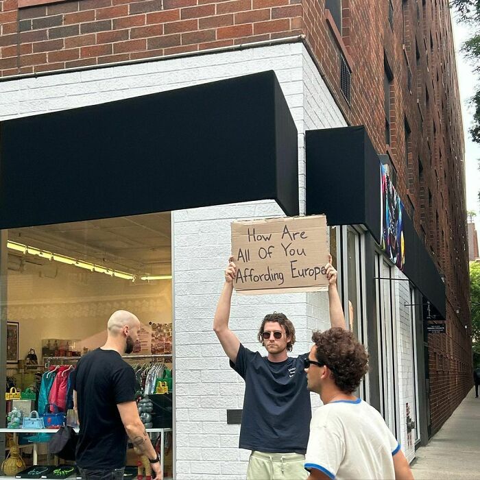 Clever-Dude-With-Sign-Protesting-Annoying-Things