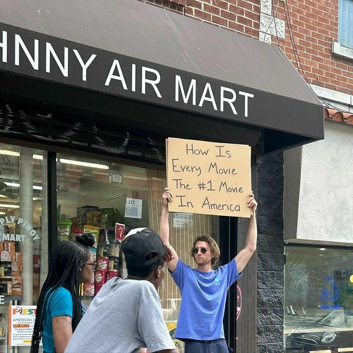 Clever-Dude-With-Sign-Protesting-Annoying-Things
