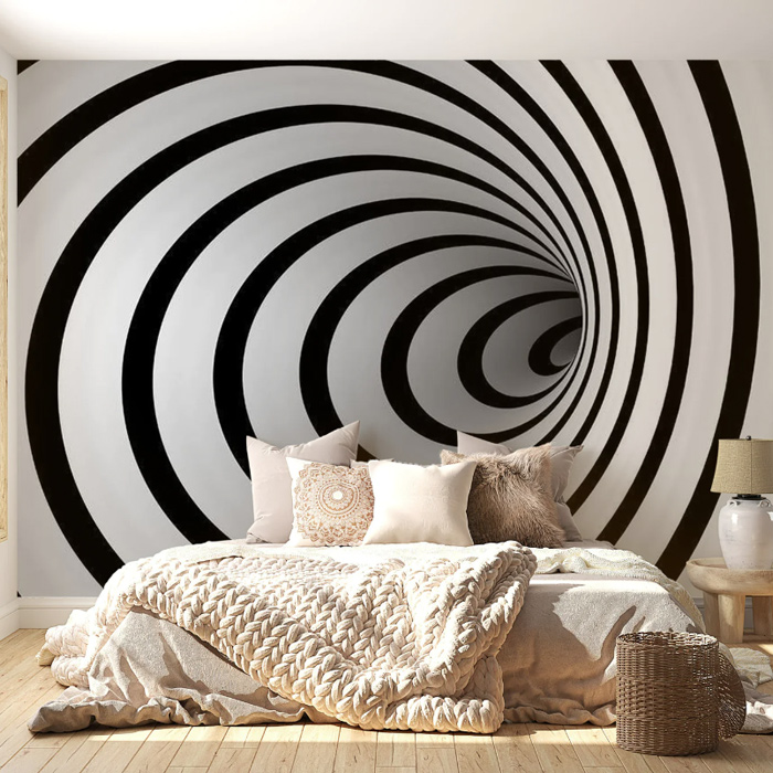 Large black and white 3D tunnel optical illusion wallpaper in bedroom