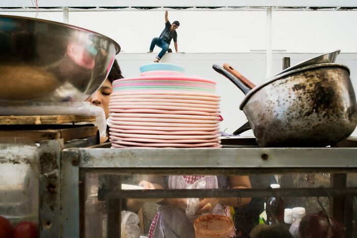 Photographer Takes To The Streets Capturing Unlikely Coincidences