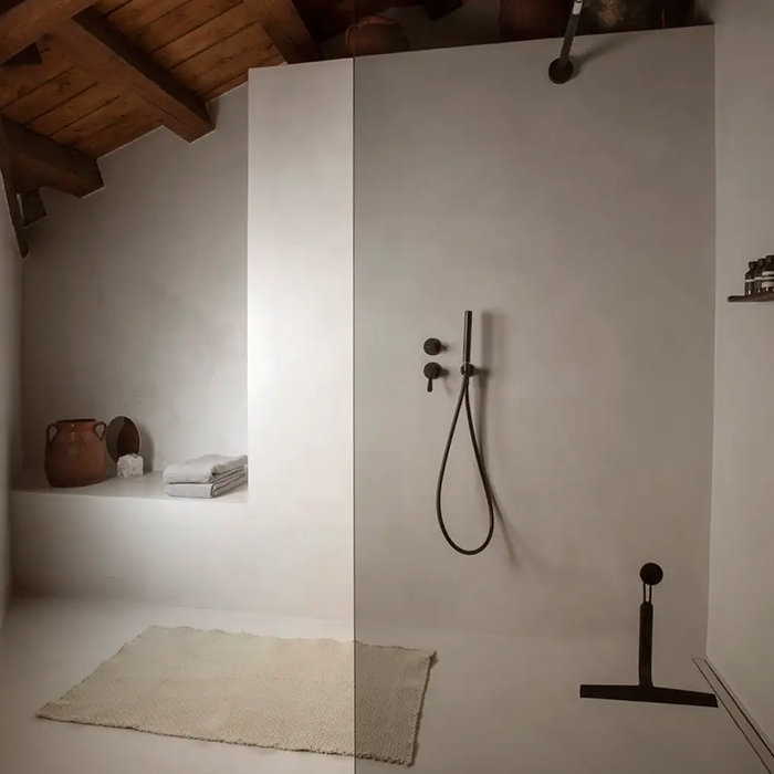 Minimal polished concrete bathroom