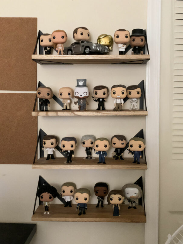 James Bond Funko Pop displayed on floating shelf
