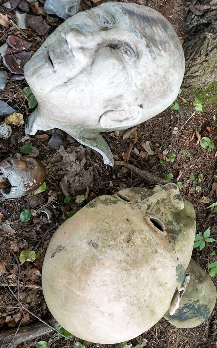 Sculptures Of Heads In The Woods. Scared The Heck Out Of Me