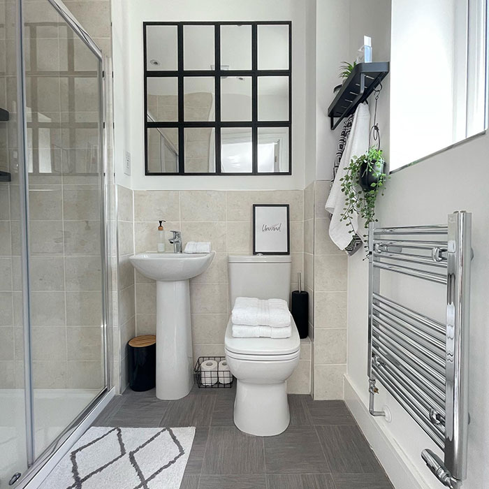 White Pedestal Sink In A White Bathroom White Pedestal Sink In A White Bathroom