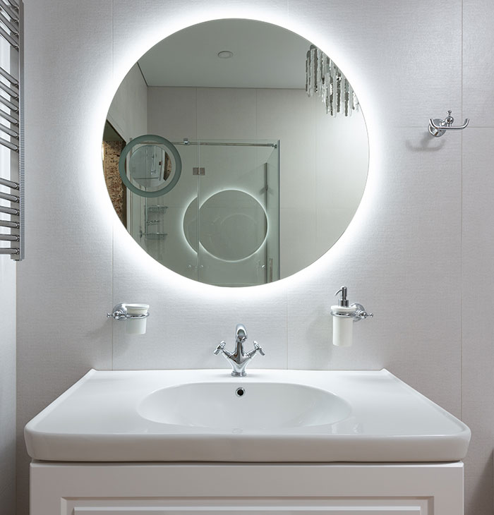 White Bathroom With Integrated Lights Behind A Mirror White Bathroom With Integrated Lights Behind A Mirror