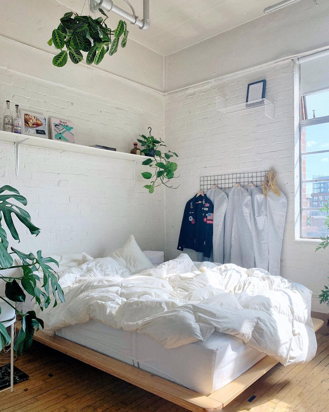 Bedroom with whitewash brick wall Bedroom with whitewash brick wall