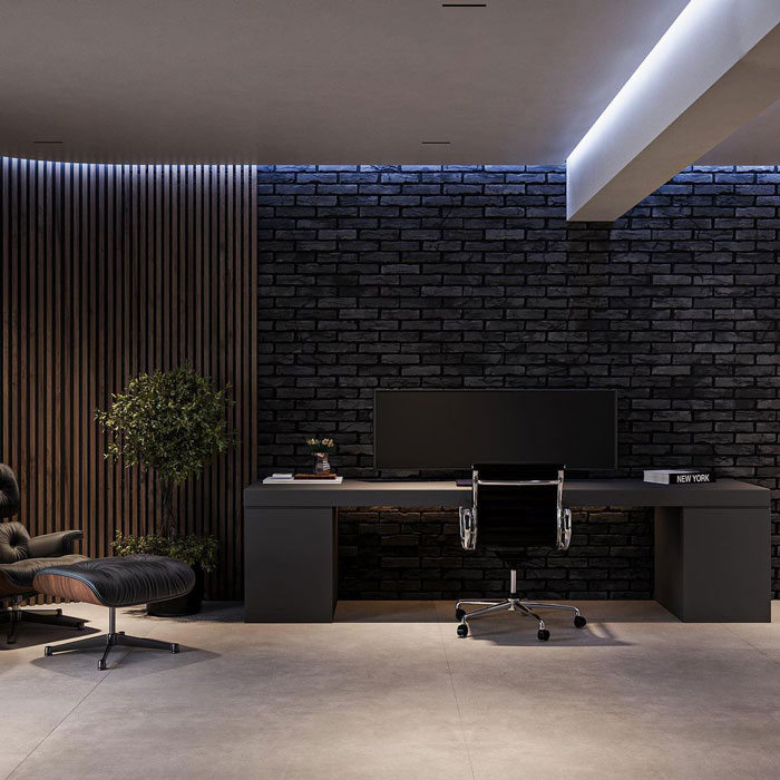 Modern office space with black brick wall design Modern office space with black brick wall design
