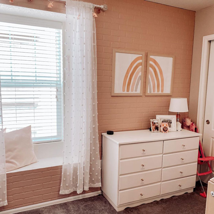 Pink painted modern faux brick wall design Pink painted modern faux brick wall design