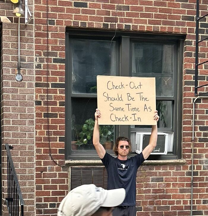 Clever-Dude-With-Sign-Protesting-Annoying-Things
