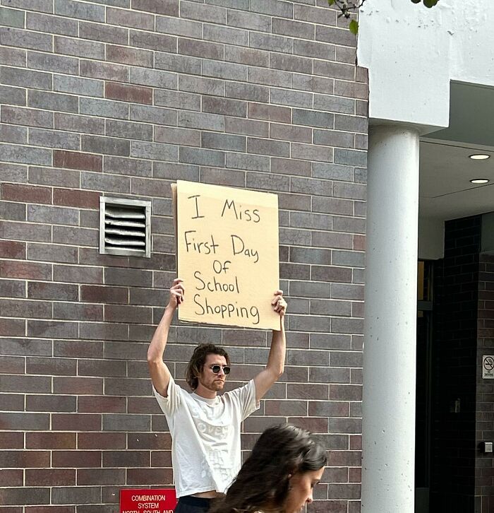 Clever-Dude-With-Sign-Protesting-Annoying-Things