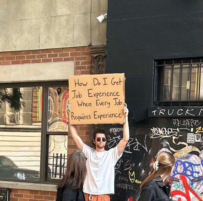 Clever-Dude-With-Sign-Protesting-Annoying-Things