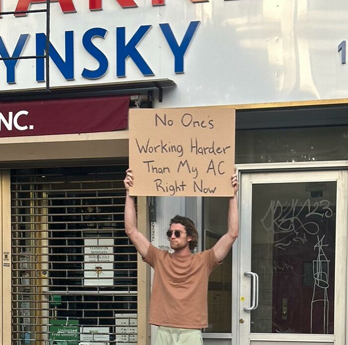 Clever-Dude-With-Sign-Protesting-Annoying-Things