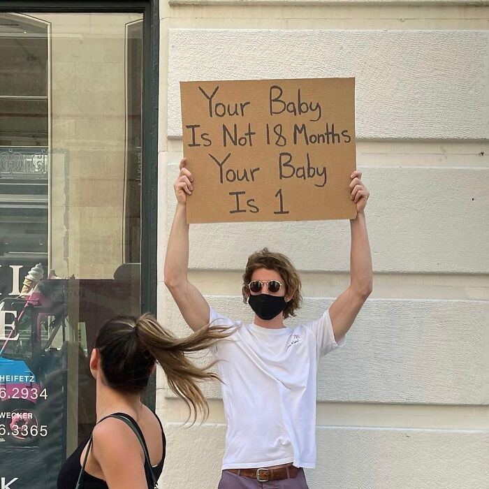 Clever-Dude-With-Sign-Protesting-Annoying-Things