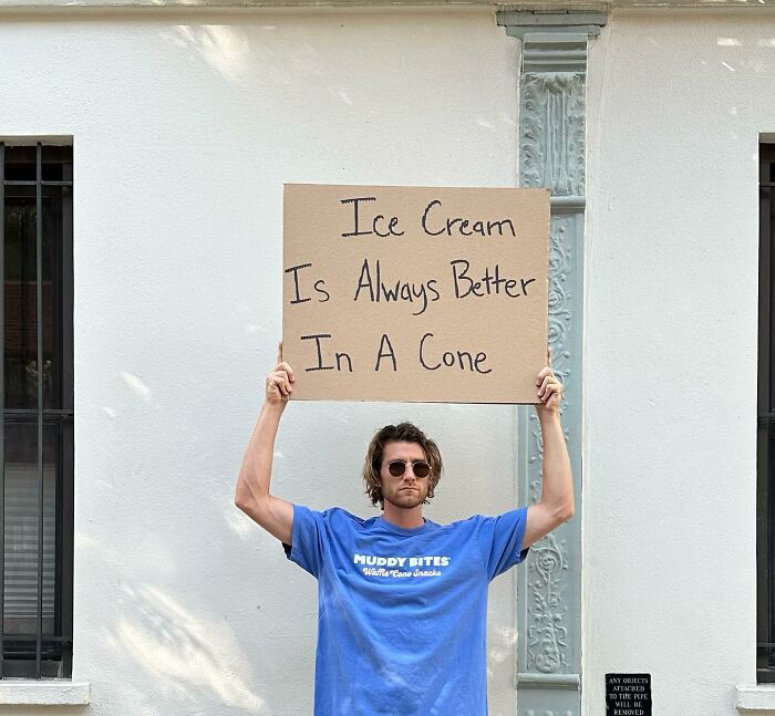 Clever-Dude-With-Sign-Protesting-Annoying-Things