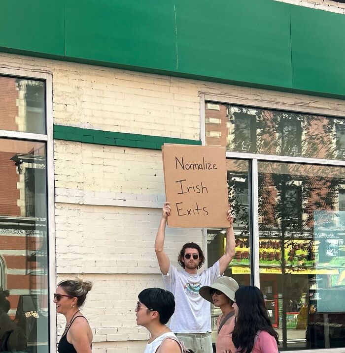 Clever-Dude-With-Sign-Protesting-Annoying-Things