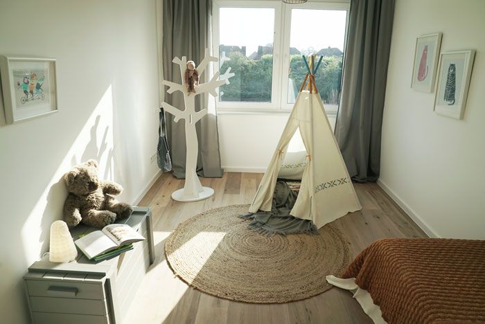 Farmhouse kids room with toy tent carpet and bed Farmhouse kids room with toy tent carpet and bed