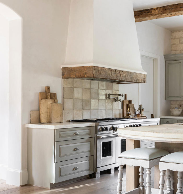 Kitchen with white wooden cupboard white table with chairs Kitchen with white wooden cupboard white table with chairs