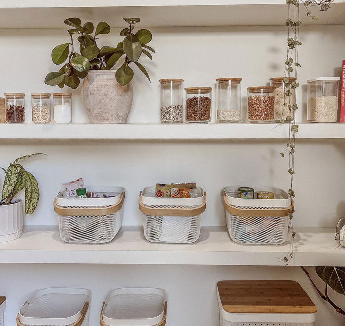 White baskets in the kitchen with spices White baskets in the kitchen with spices