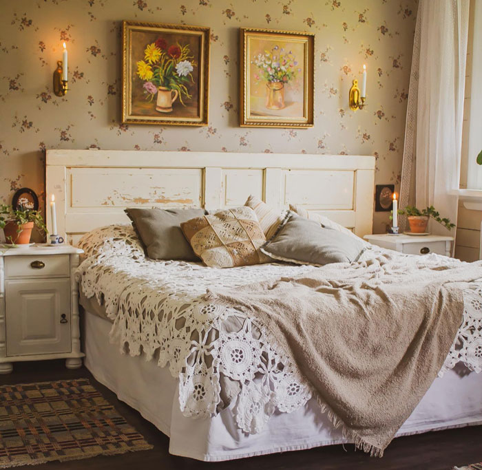 Bed with ornament sheets flower wallpapers room and paintings Bed with ornament sheets flower wallpapers room and paintings