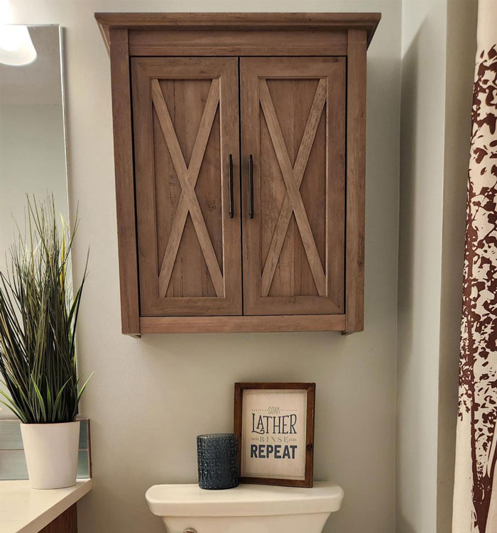 Rustic wooden storage in bathroom Rustic wooden storage in bathroom