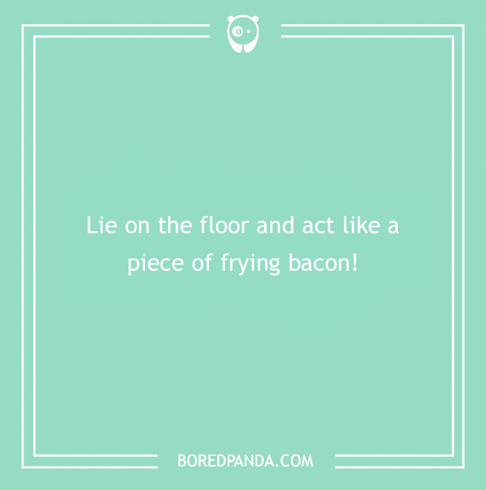Funny dare card: "Lie on the floor and act like a piece of frying bacon!" on a teal background.
