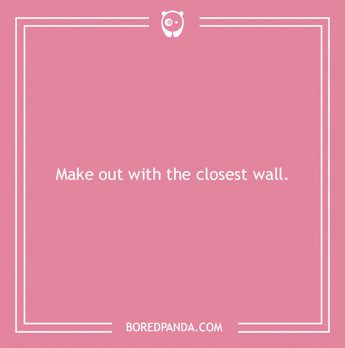 Pink background with funny dare text saying, "Make out with the closest wall."
