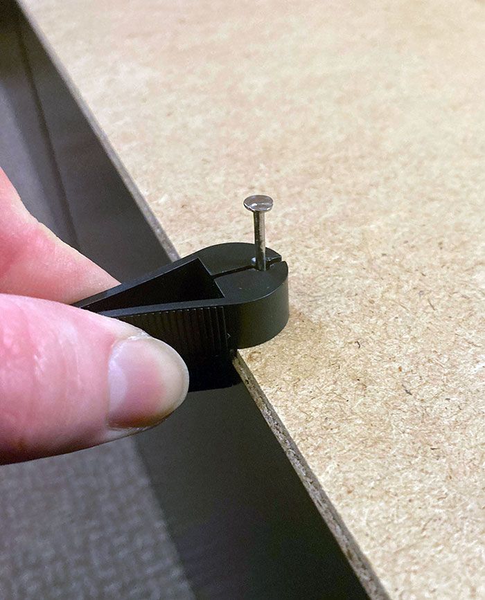 My Bookshelf Came With A Tool To Hold The Nails And Position Them Perfectly
