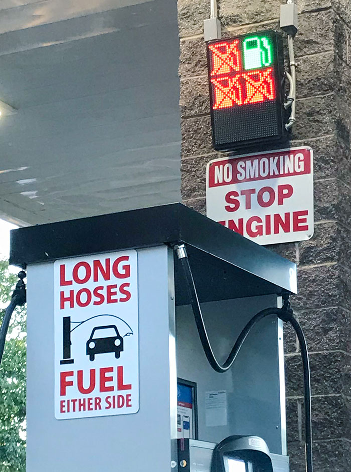 This Gas Station Has Indicators For Which Pumps Are In Use, And The Hoses Can Reach Both Sides Of The Car