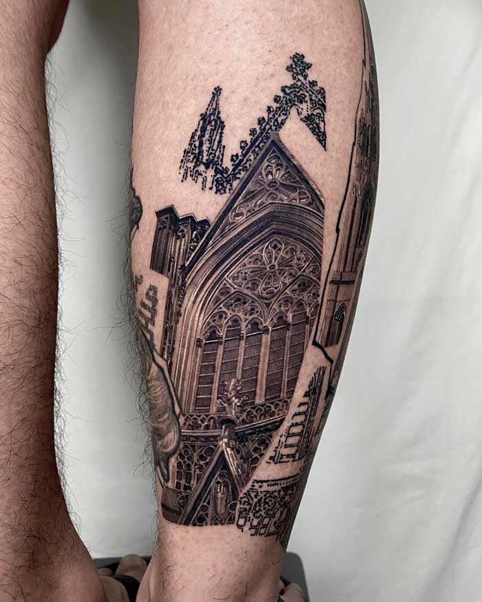 Intricate gothic tattoo depicting cathedral architecture on leg, showcasing detailed design elements.