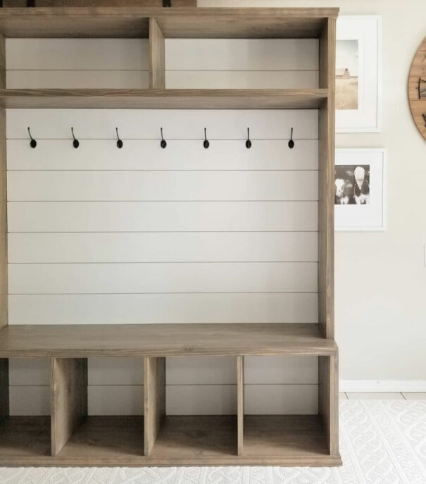 A brown and white modern hall tree made of wood A brown and white modern hall tree made of wood