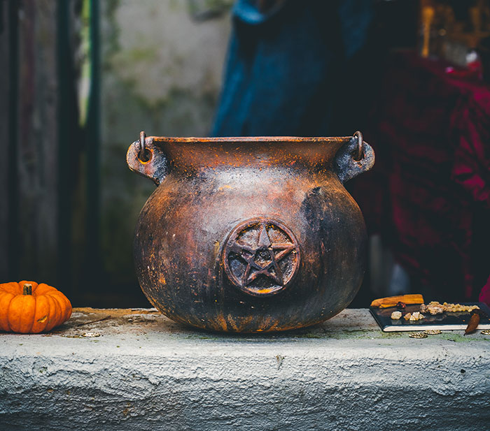 crone's cauldron at the table