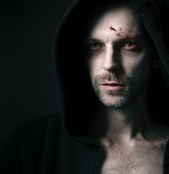 Man wearing Dracula costume