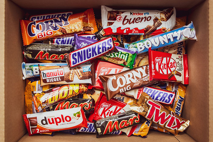 Snickers, Twix, KitKat, Bounty candies in the box