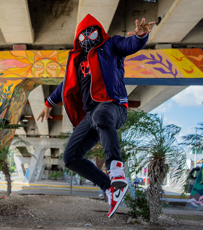 Man wearing Spider Man costume
