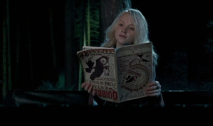 Luna Lovegood with a magazine